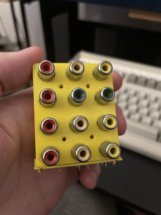 A 3x4 matrix of RCA connectors.