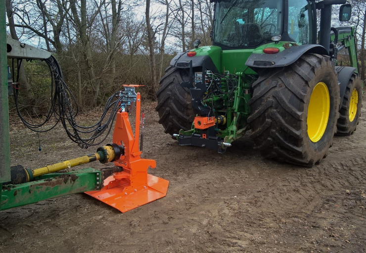 A tractor and trailer with lots of wires connecting them